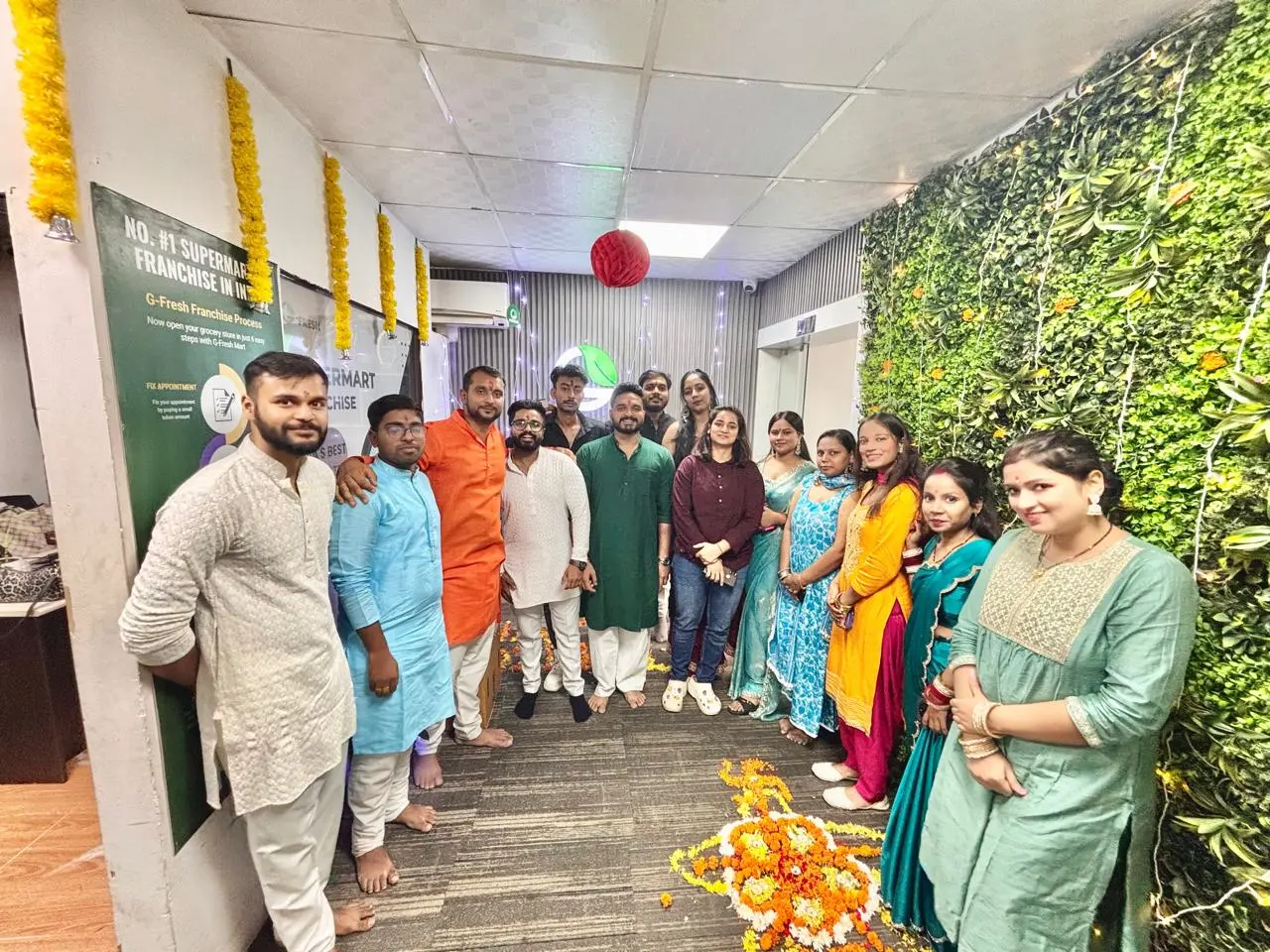 G Fresh Mart team in traditional wear celebrating Diwali at the Noida office